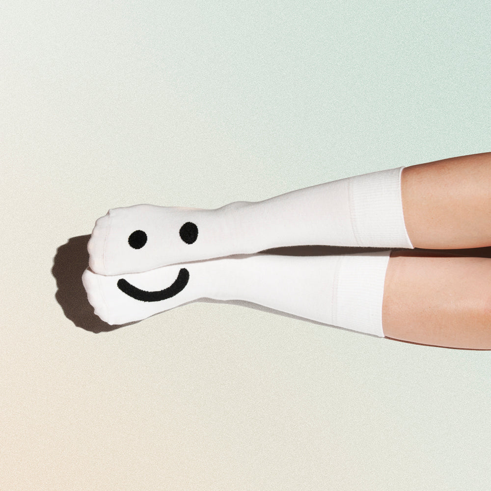 smiley socks one half eyes one half smile
