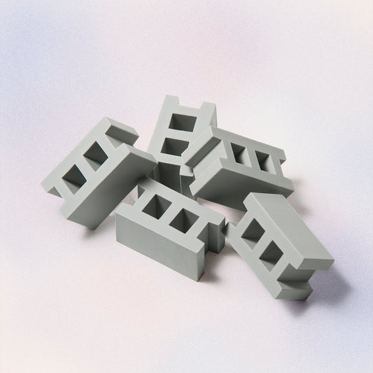 small tiny miniature cement concrete blocks that are also erasers