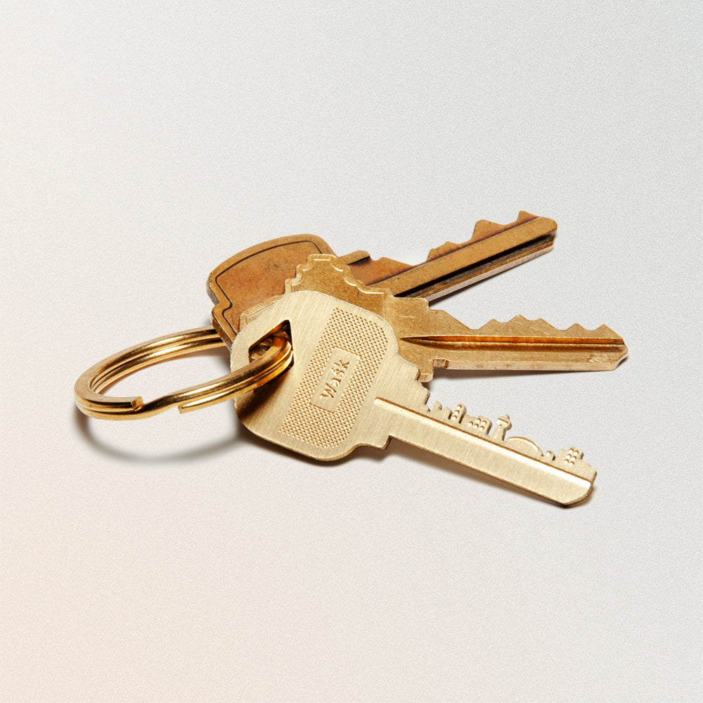 a key keychain featuring the toronto city skyline