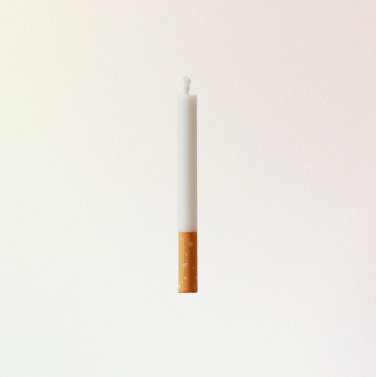 cigarette candle in a cupcake