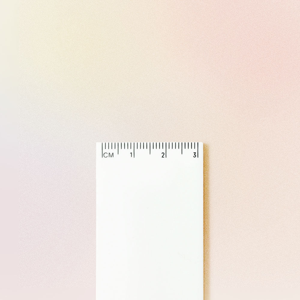 short-sided ruler with measurements on small edge